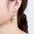 Picture of Sparkly Big White Dangle Earrings